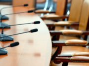 close up of a microphone in empty conference hall